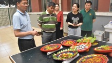 成人教育学院举办“五彩三月三 共拼成教美”主题活动